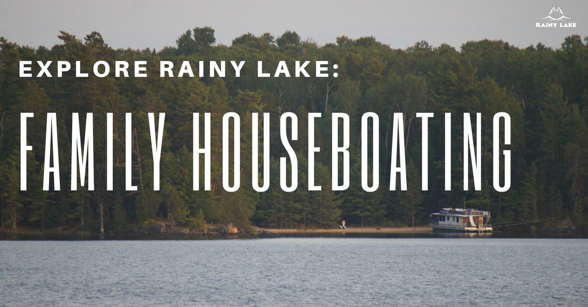 family houseboating on rainy lake